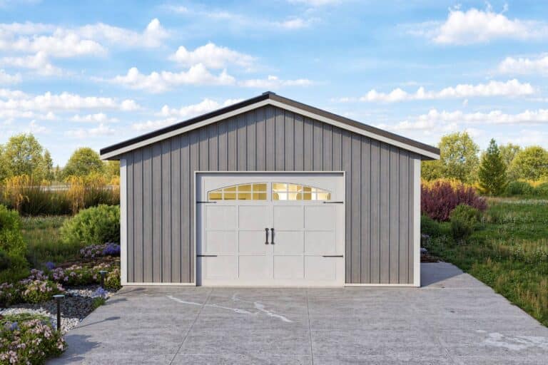 Grey one-car value series garage with white garage door on driveway