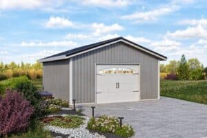 Value series one-car garage in driveway with landscaping