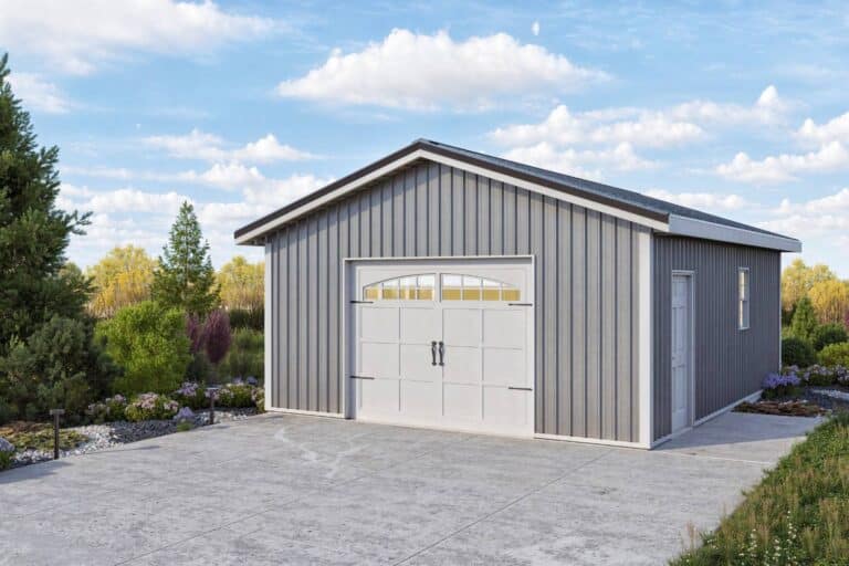 Right corner of grey value series one-car garage with surrounding trees and on driveway